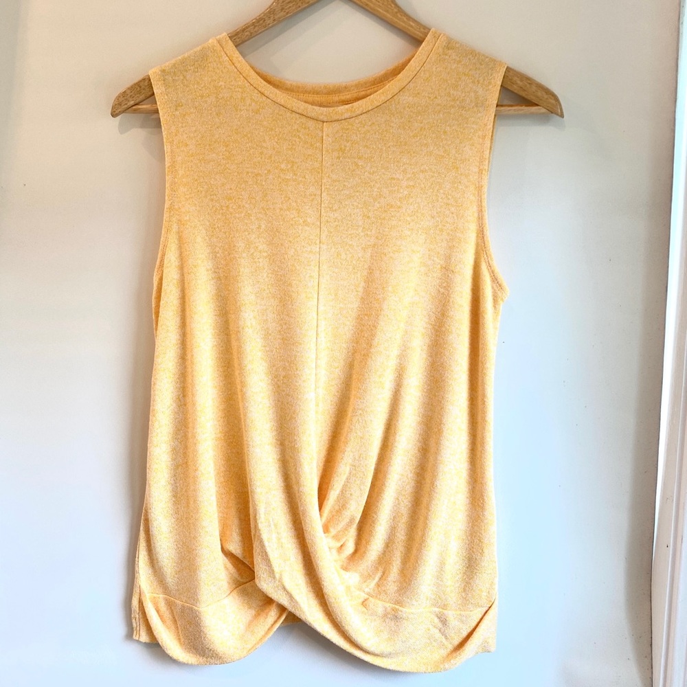 Sleeveless Top with Twist at the Bottom